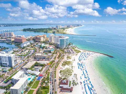 Aerial view of Clearwater Beach, Florida with white sand, turquoise gulf water and beachfront hotels